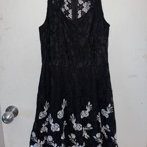 Black dress with white flowers at the bottom